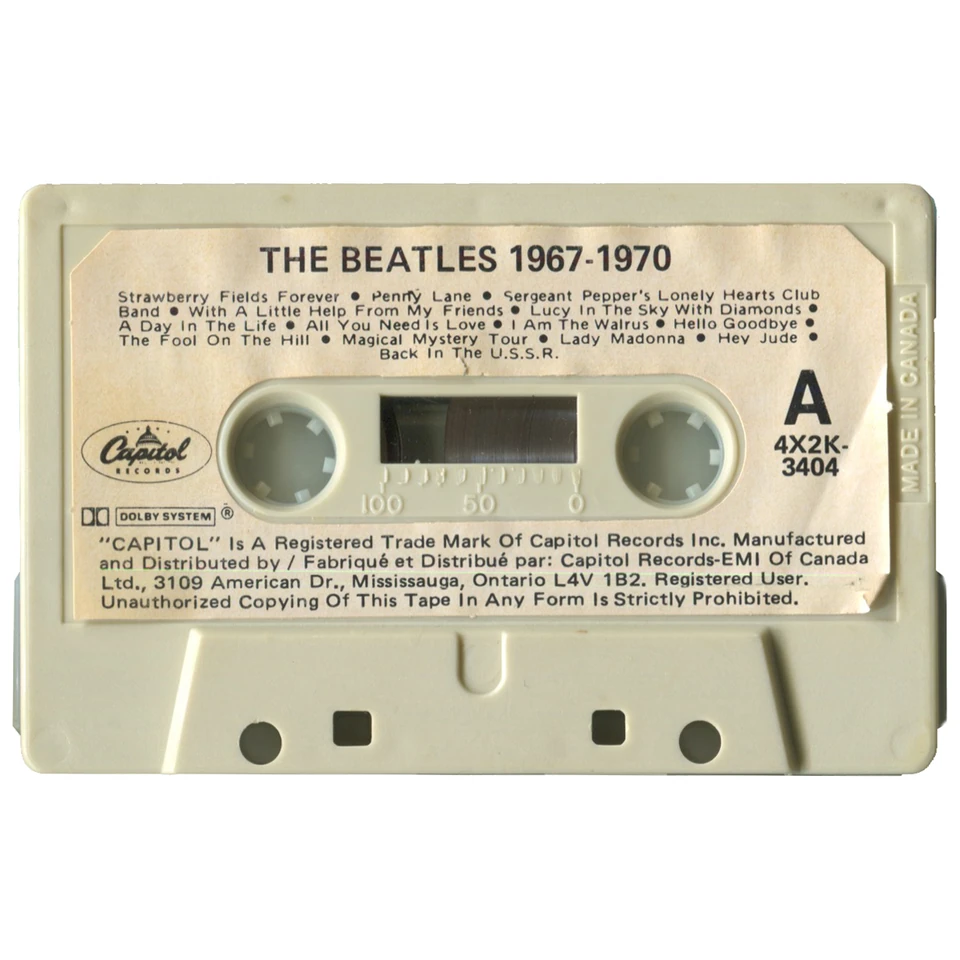 Capitol white paper label with the Capitol-EMI text and the Mississauga address, on an off-white shell